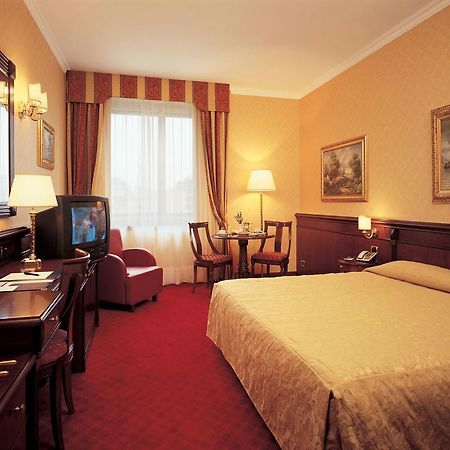 Atahotel Executive Milánó Szoba fotó