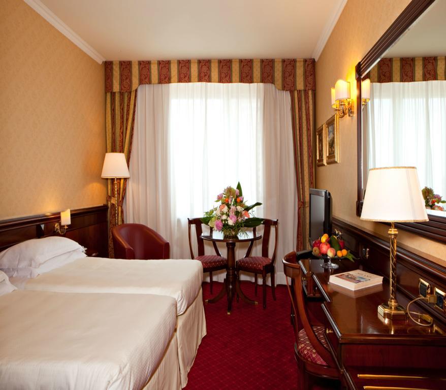 Atahotel Executive Milánó Szoba fotó