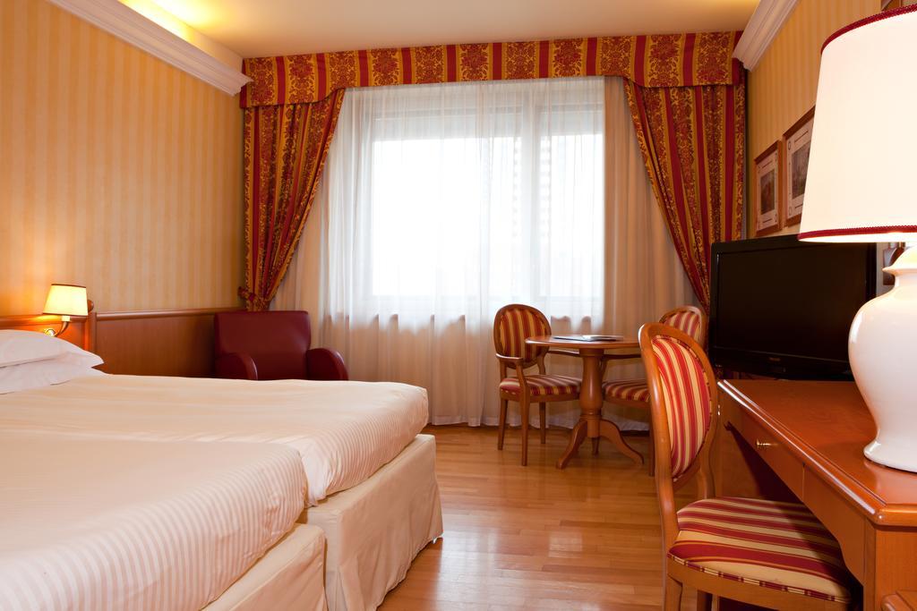 Atahotel Executive Milánó Szoba fotó
